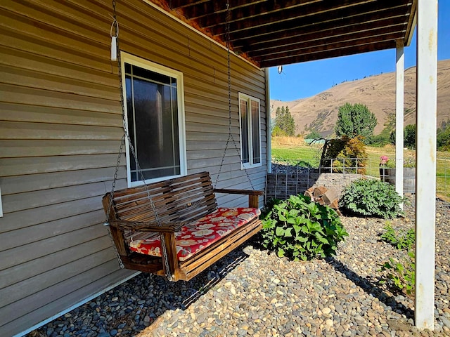 view of terrace featuring a mountain view