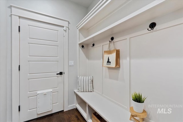 mudroom with dark hardwood / wood-style floors