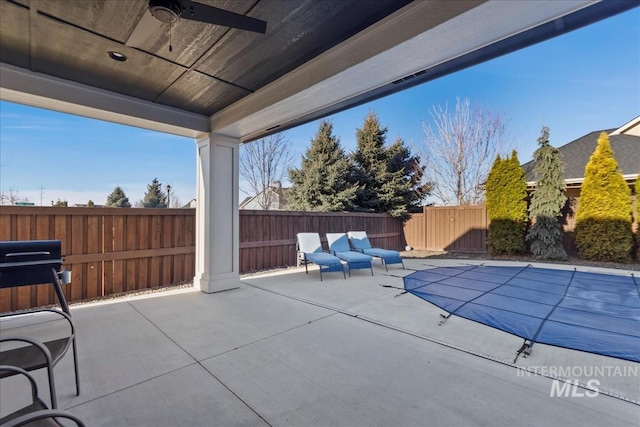 view of patio / terrace featuring ceiling fan