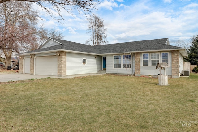 ranch-style house featuring driveway, cooling unit, a front yard, a garage, and brick siding