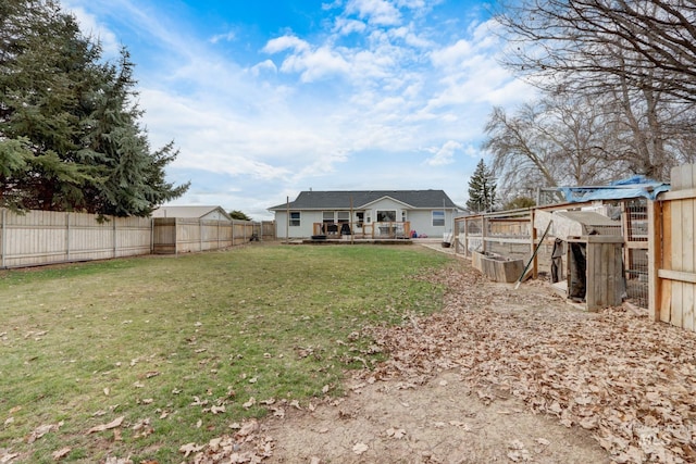 view of yard featuring a fenced backyard