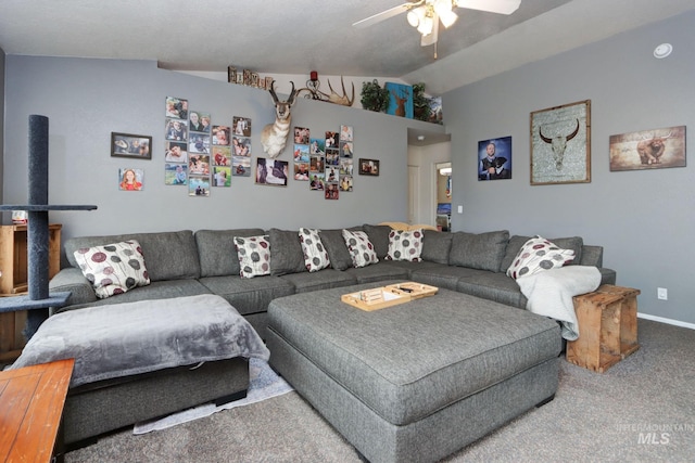 carpeted living room featuring vaulted ceiling, baseboards, and ceiling fan