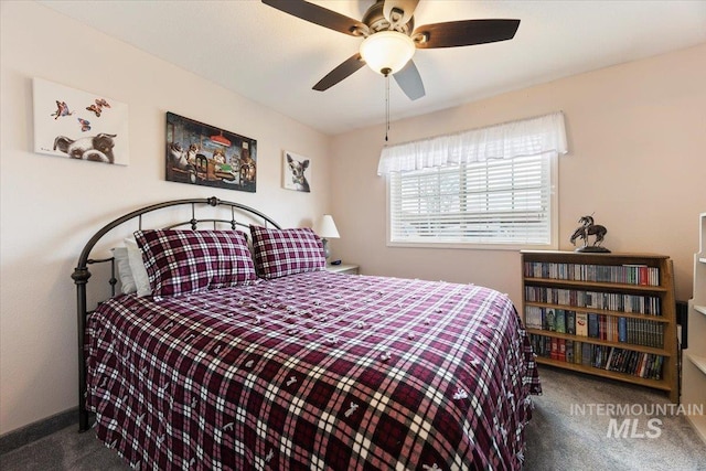 carpeted bedroom with ceiling fan