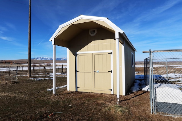view of outbuilding with a mountain view
