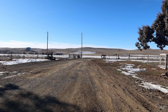 view of street featuring a mountain view and a rural view