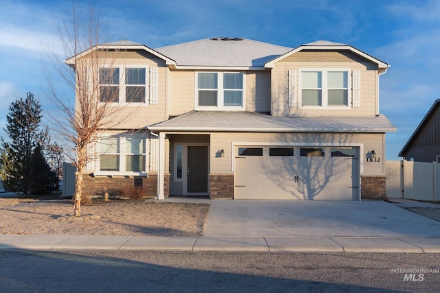 craftsman house with a garage