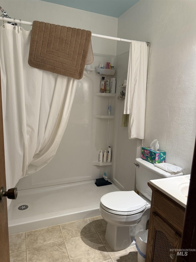 26 Doaka Ct, Idaho City, ID 83631 - bathroom with a shower stall, toilet, and vanity