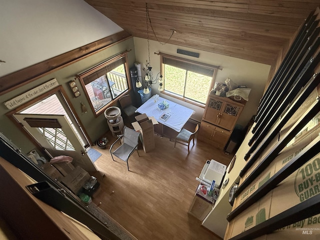 26 Doaka Ct, Idaho City, ID 83631 - living area featuring lofted ceiling, wood ceiling, and wood finished floors