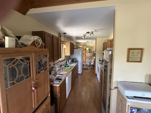 26 Doaka Ct, Idaho City, ID 83631 - kitchen featuring white appliances, wood finished floors, a sink, and light countertops