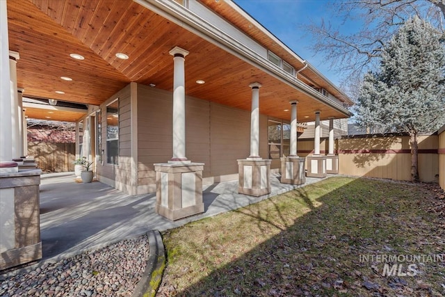 view of side of property with fence