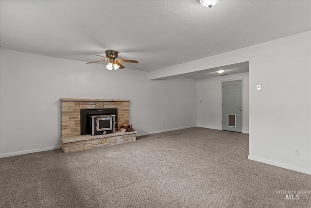 7313 W Court Ave, Boise, ID 83704 - unfurnished living room featuring ceiling fan, carpet flooring, and baseboards