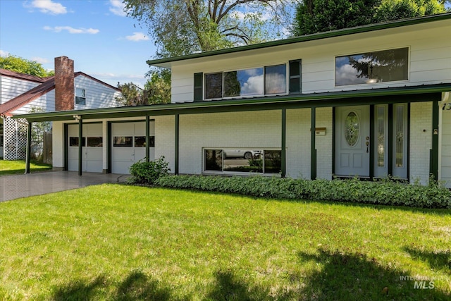 7313 W Court Ave, Boise, ID 83704 - view of front of home featuring brick siding, a garage, and a front yard