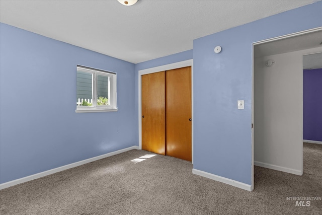 7313 W Court Ave, Boise, ID 83704 - unfurnished bedroom featuring carpet, a closet, and baseboards