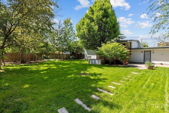 7313 W Court Ave, Boise, ID 83704 - view of yard with a patio area