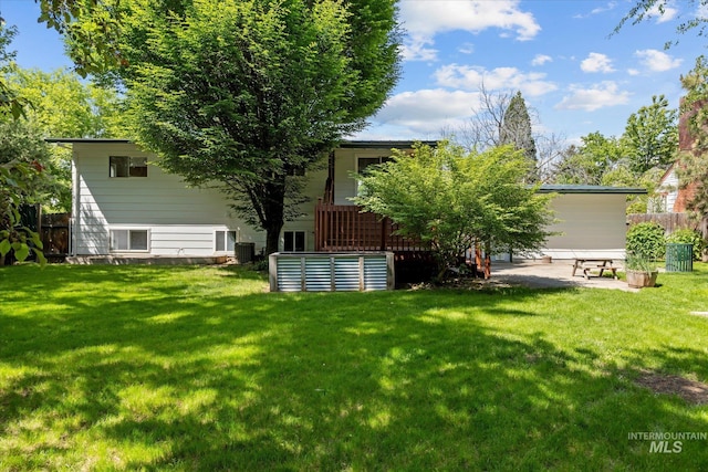 7313 W Court Ave, Boise, ID 83704 - rear view of house featuring a patio and central air condition unit
