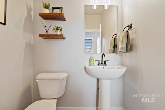 bathroom featuring toilet