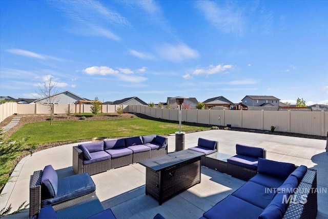 view of patio with an outdoor hangout area, a fenced backyard, and a residential view