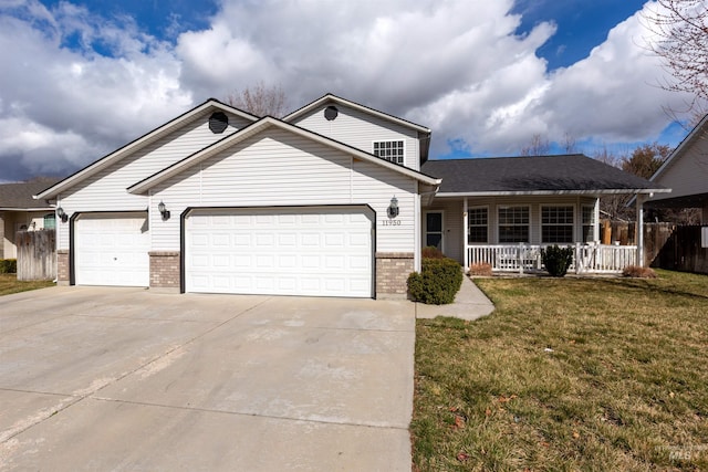 view of front of house featuring driveway, a porch, an attached garage, a front yard, and brick siding