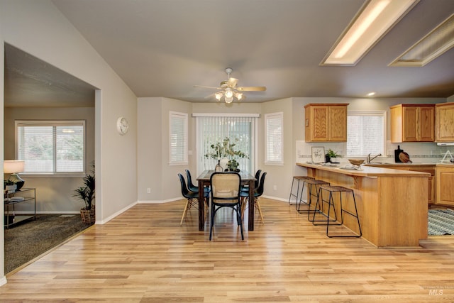 dining area featuring recessed lighting, light wood-style floors, baseboards, and ceiling fan