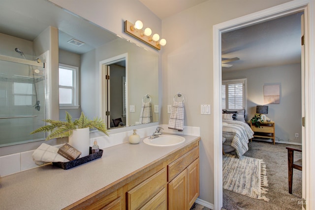 ensuite bathroom featuring a wealth of natural light, visible vents, a stall shower, and ensuite bath