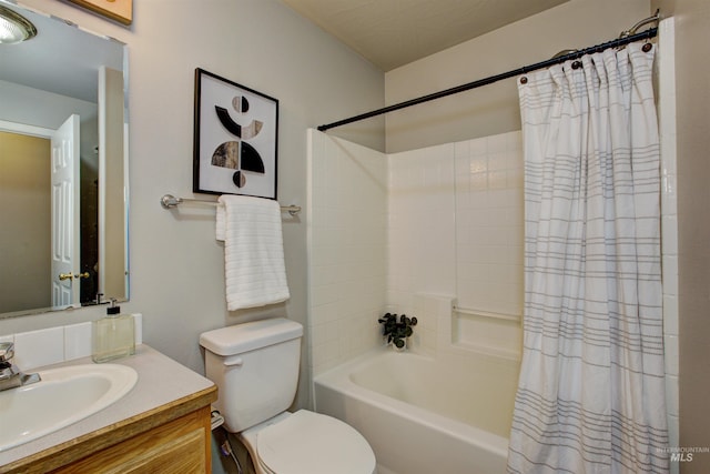 bathroom with toilet, vanity, and shower / bath combo