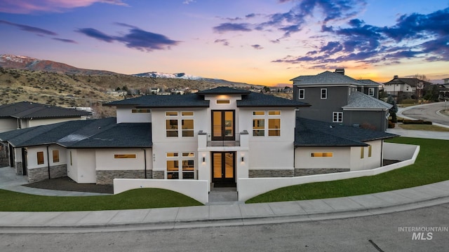 view of front of house with a mountain view