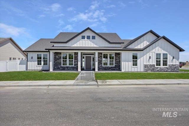 3119 Crescent Moon Rd, Twin Falls, ID 83301 - modern farmhouse with board and batten siding, a shingled roof, and stone siding