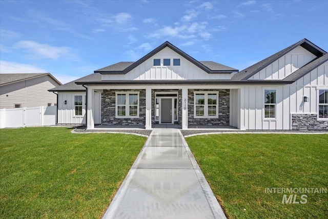 3119 Crescent Moon Rd, Twin Falls, ID 83301 - modern inspired farmhouse with board and batten siding, covered porch, stone siding, and roof with shingles