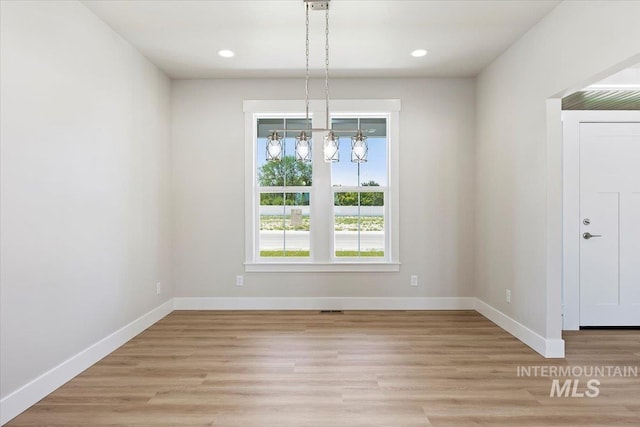 3119 Crescent Moon Rd, Twin Falls, ID 83301 - unfurnished dining area featuring light wood-style flooring and recessed lighting