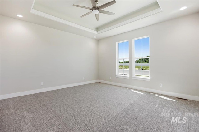 3119 Crescent Moon Rd, Twin Falls, ID 83301 - spare room featuring a raised ceiling, a ceiling fan, carpet floors, and recessed lighting