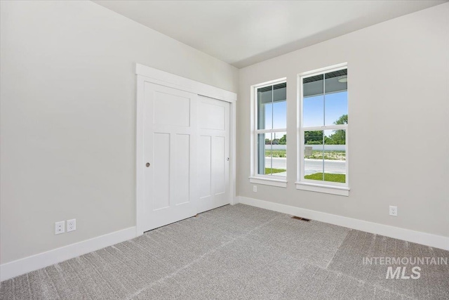 3119 Crescent Moon Rd, Twin Falls, ID 83301 - unfurnished bedroom featuring carpet floors and a closet