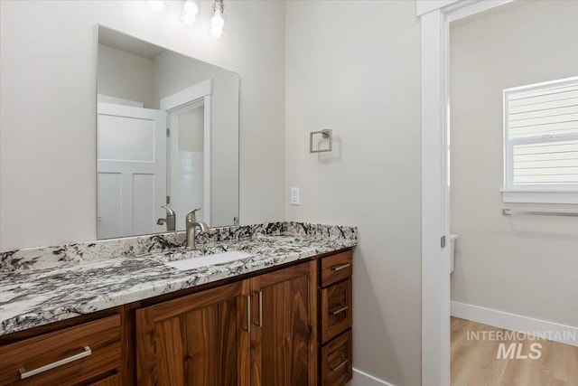 3119 Crescent Moon Rd, Twin Falls, ID 83301 - bathroom with vanity and wood finished floors
