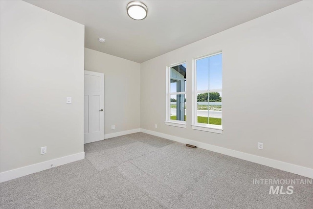 3119 Crescent Moon Rd, Twin Falls, ID 83301 - carpeted empty room with baseboards