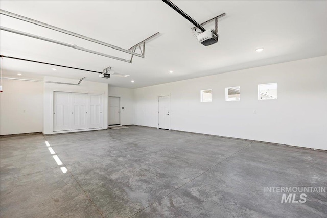 3119 Crescent Moon Rd, Twin Falls, ID 83301 - garage with a garage door opener and recessed lighting
