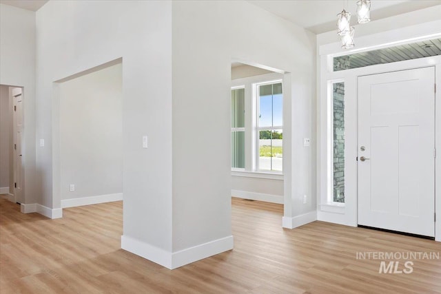 3119 Crescent Moon Rd, Twin Falls, ID 83301 - foyer with light wood-style floors and baseboards