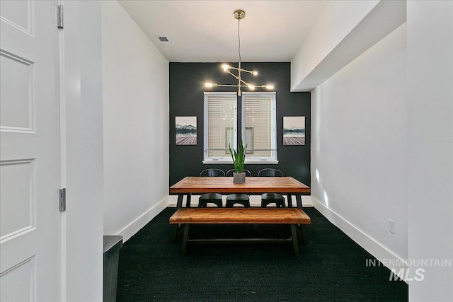 dining room with visible vents and baseboards