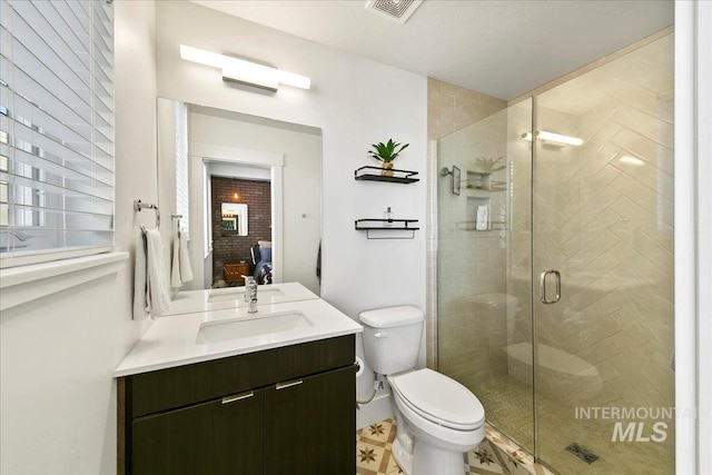 full bath featuring visible vents, toilet, connected bathroom, a shower stall, and vanity