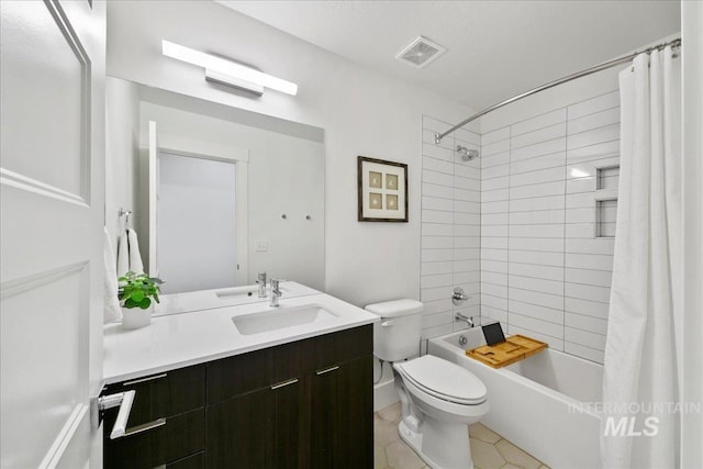 bathroom with shower / tub combo, visible vents, vanity, and toilet