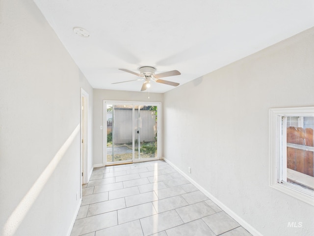 2624 Iowa Ave, Caldwell, ID 83605 - spare room featuring ceiling fan and light tile patterned floors