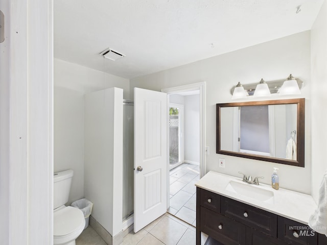 2624 Iowa Ave, Caldwell, ID 83605 - bathroom with tile patterned flooring, vanity, and a shower stall