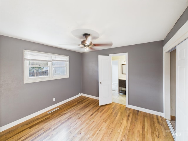 2624 Iowa Ave, Caldwell, ID 83605 - unfurnished bedroom featuring light wood finished floors and ceiling fan
