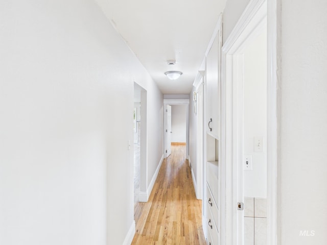 2624 Iowa Ave, Caldwell, ID 83605 - corridor with light wood finished floors and baseboards
