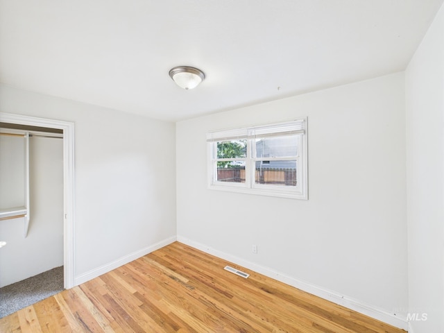 2624 Iowa Ave, Caldwell, ID 83605 - unfurnished bedroom with light wood-style floors and a closet