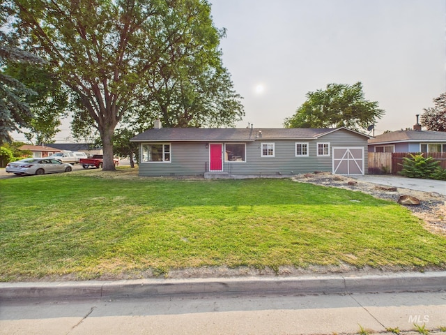 2624 Iowa Ave, Caldwell, ID 83605 - single story home with concrete driveway and an attached garage