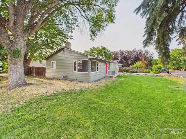 2624 Iowa Ave, Caldwell, ID 83605 - view of home's exterior featuring a chimney