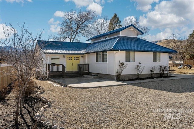 back of property featuring a patio area