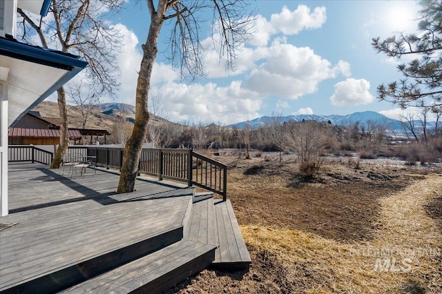 deck with a mountain view