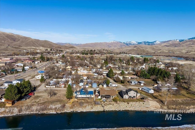 aerial view with a water and mountain view