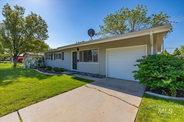 ranch-style house with a front lawn and a garage