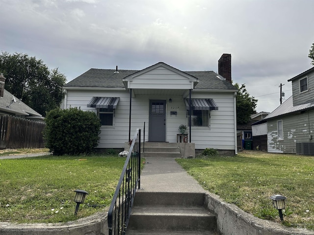 821 3rd St, Lewiston, ID 83501 - bungalow-style house featuring a chimney and roof with shingles